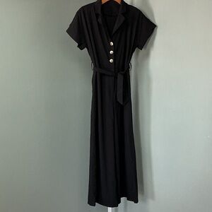 Black comfortable romper/ jump suit.
P2P 21”
W 19.5”
L 55”